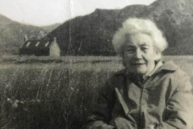 Nellie MacQueen pictured infront of her old home, which was used as a cattle byre and then a bothy for walkers after the family left. PIC: MacDonald family.