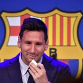 Lionel Messi cries during his press conference at the Camp Nou stadium in Barcelona.