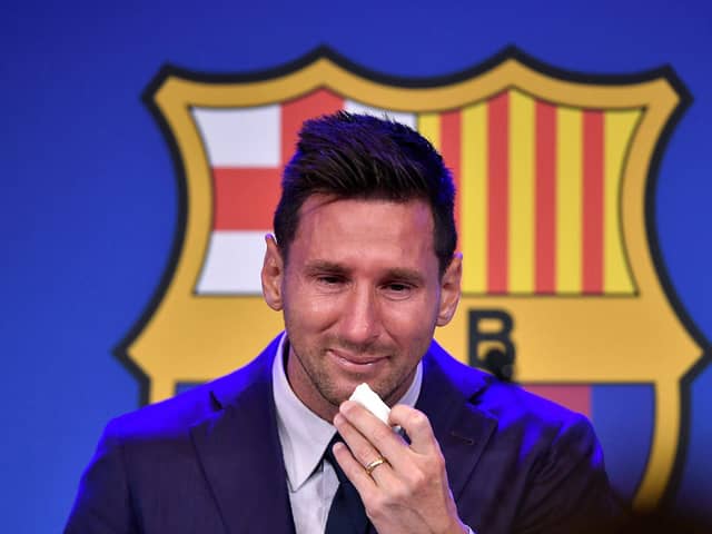 Lionel Messi cries during his press conference at the Camp Nou stadium in Barcelona.