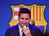 Lionel Messi cries during his press conference at the Camp Nou stadium in Barcelona.