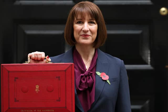 LONDON, ENGLAND - OCTOBER 30: Chancellor Rachel Reeves poses with the red box outside number 11 Downing Street on October 30, 2024 in London, England. This is the first Budget presented by the new Labour government and Chancellor of the Exchequer, Rachel Reeves. (Photo by Dan Kitwood/Getty Images)