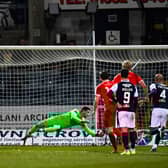 Lee Currie scores to make it 1-0 Bonnyrigg Rose during an epic Scottish Cup tie between Dundee and Bonnyrigg Rose Athletic at Dens Park. The hosts eventually won 3-2 after extra time (Photo by Rob Casey / SNS Group)