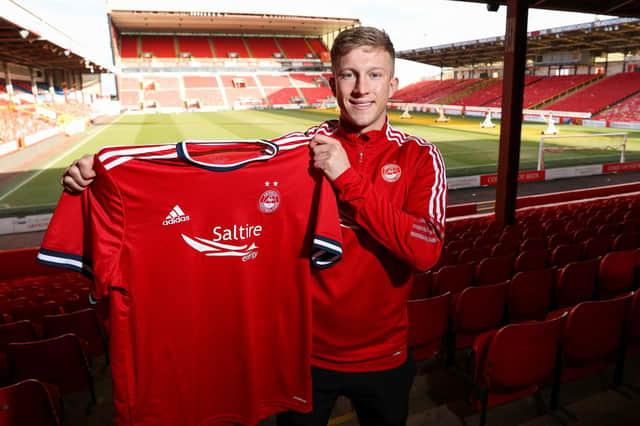 Aberdeen's Ross McCrorie has signed a new two-year contract extension until 2026 .
