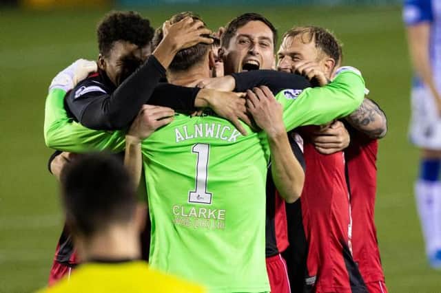 The St Mirren players celebrate after winning the penalty shootout . (Photo by Craig Williamson / SNS Group)