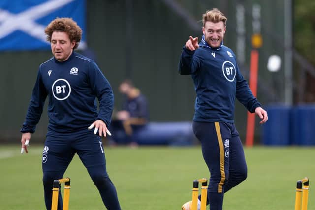 Scotland captain Stuart Hogg points at a hirsute Duncan Weir during training ahead of the Wales match. Picture: Craig Williamson/SNS
