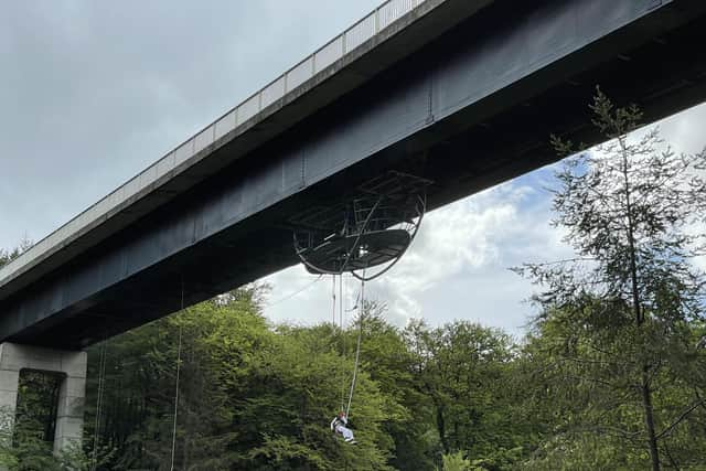 Francois-Marie Dibon takes a leap from the bridge.