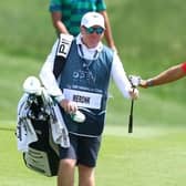 Adrian Meronk and Stuart Beck, his trusy Scottis caddie, walk on the second hole during day three of the DS Automobiles Italian Open at Marco Simone Golf Club. Picture: Naomi Baker/Getty Images.