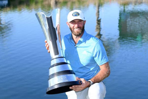 Dustin Johnson celebrates winning the Saudi International powered by SoftBank Investment Advisers for the second time at Royal Greens Golf and Country Club in King Abdullah Economic City in February. Picture: Ross Kinnaird/Getty Images.