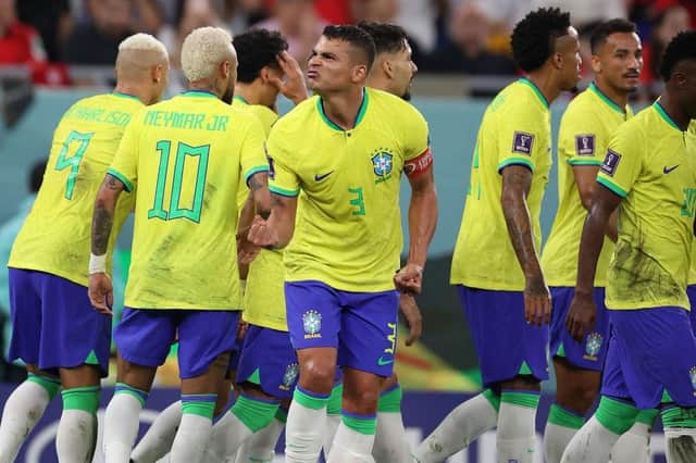 Thiago Silva of Brazil celebrates his side's fourth goal scored by Lucas Paqueta during the FIFA World Cup Qatar 2022 Round of 16 match between Brazil and South Korea at Stadium 974 on December 05, 2022 in Doha, Qatar. (Photo by Michael Steele/Getty Images)