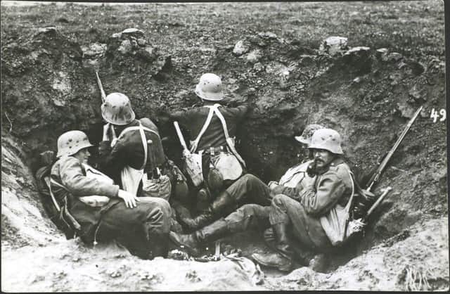 German soldiers defend a shell-hole during the First World War PIC: The Hulton Archive / Getty Images