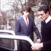 Jeremy Bamber, convicted of the killings of Neville and June Bamber, daughter Sheila Caffell and her twin boys, in 1985, is pictured in handcuffs, escorted by police
