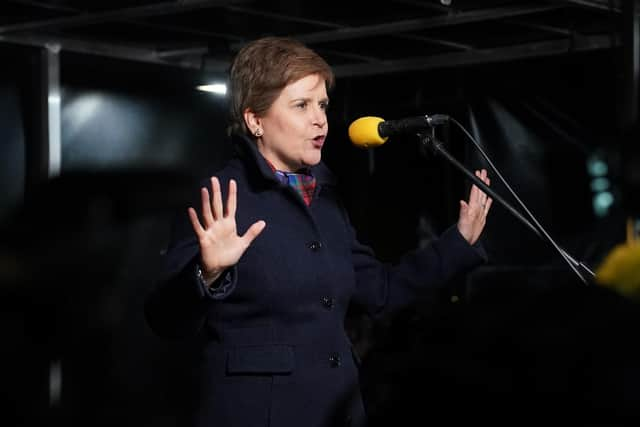 Nicola Sturgeon speaking at a rally outside the Scottish Parliament