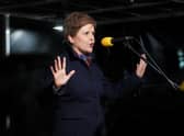 Nicola Sturgeon speaking at a rally outside the Scottish Parliament