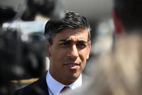 Prime Minister Rishi Sunak speaks with journalists after landing in Vilnius, Lithuania, where he will attend a Nato summit. Picture: Paul Ellis -Pool/Getty Images