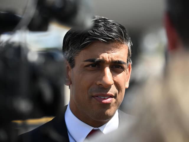 Prime Minister Rishi Sunak speaks with journalists after landing in Vilnius, Lithuania, where he will attend a Nato summit. Picture: Paul Ellis -Pool/Getty Images