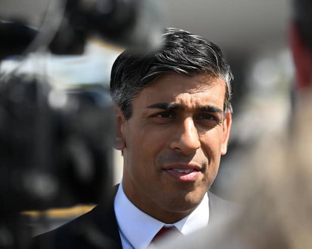 Prime Minister Rishi Sunak speaks with journalists after landing in Vilnius, Lithuania, where he will attend a Nato summit. Picture: Paul Ellis -Pool/Getty Images