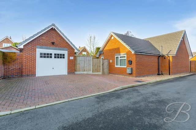 This two-bedroom bungalow at Ley Bank, Mansfield is on the market with estate agents BuckleyBrown for a guide price of £250,000. The block-paved driveway and detached garage provide plenty of space for off-street parking.