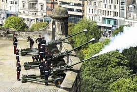 Crowds gathered in Edinburgh for a 96-round gun salute in tribute to the late queen
Pic: Lisa Ferguson