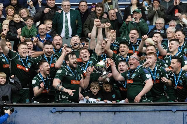 Hawick players celebrate winning the Scottish Cup after defeating Marr at BT Murrayfield.