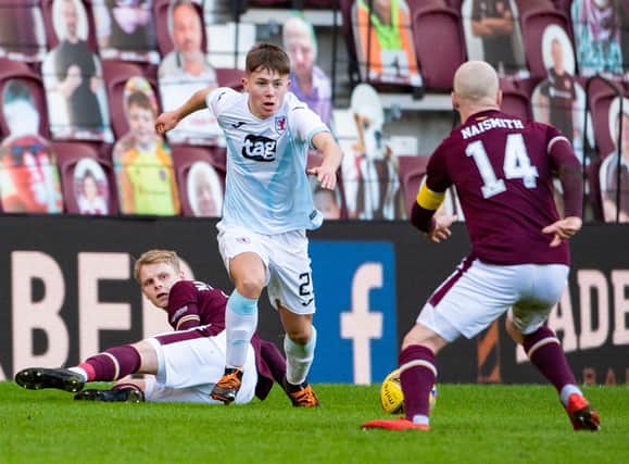 Rangers youngster Kai Kennedy takes on Hearts captain Steven Naismith during his impressive debut for loan side Raith Rovers (Photo by Paul Devlin / SNS Group)