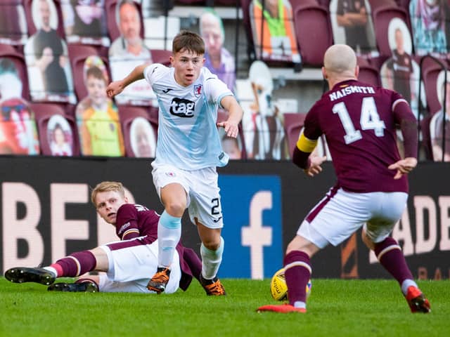 Rangers youngster Kai Kennedy takes on Hearts captain Steven Naismith during his impressive debut for loan side Raith Rovers  (Photo by Paul Devlin / SNS Group)