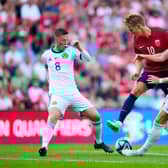 Scotland midfielders Callum McGregor and Scott McTominay challange Norway's Martin Odegaard. (Photo by FREDRIK VARFJELL/NTB/AFP via Getty Images)