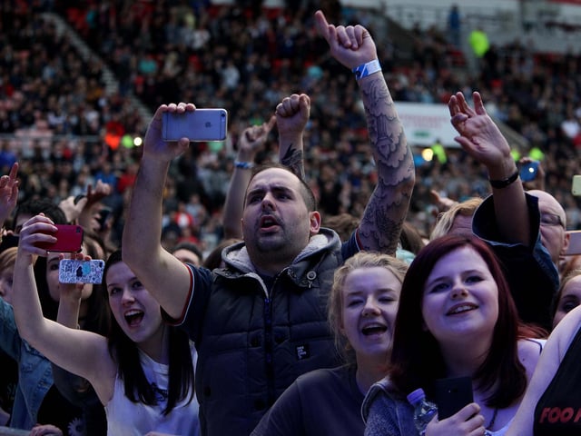 Fans listen to front man Dave Grohl and the Foo Fighters. Picture: DAVID WOOD