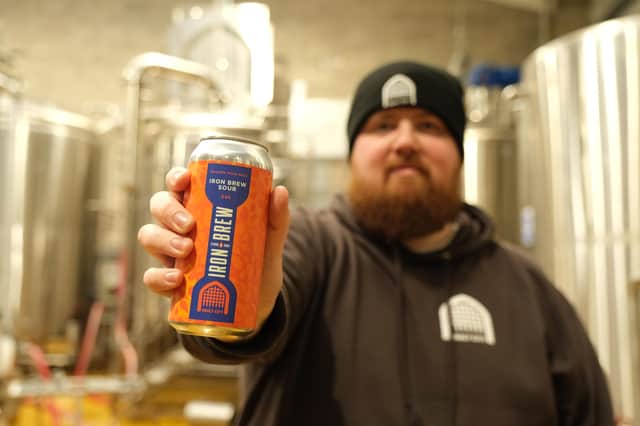 Joe Cruickshank with the Iron Brew beer