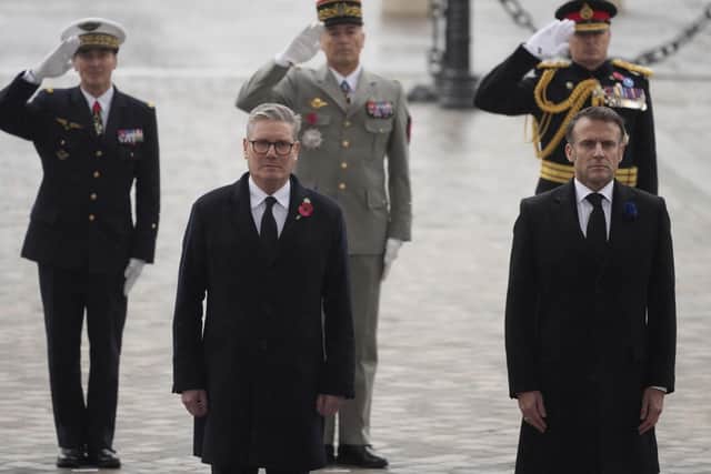 French President Emmanuel Macron (right) and British Prime Minister Keir Starmer attend ceremonies marking the 106th anniversary of the Armistice. Picture: AP Photo/Michel Euler, Pool
