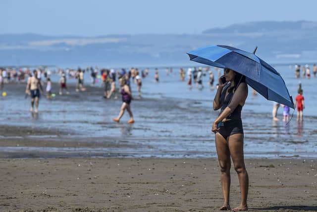 Members of the public at Portobello Beach amid the heatwave. Picture: Lisa Ferguson