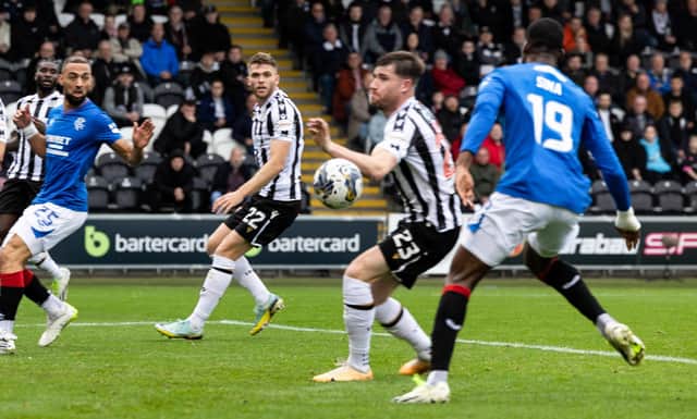 St Mirren's Ryan Strain handles the ball and concedes a penalty to Rangers. (Photo by Craig Foy / SNS Group)