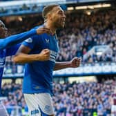 Rangers' Cyriel Dessers celebrates with Dujon Sterling after making it 3-0 in Rangers' 5-0 win over Hearts at Ibrox (Photo by Alan Harvey / SNS Group)