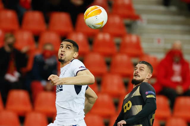 Standard Liege's Maxime Lestienne, right, has tested positive for Covid-19 just days after playing Rangers.