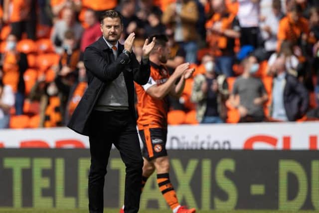 Dundee United manager Tam Courts applauds the home support after his team's 1-0 win over Rangers at Tannadice. (Photo by Craig Williamson / SNS Group)