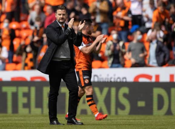 Dundee United manager Tam Courts applauds the home support after his team's 1-0 win over Rangers at Tannadice. (Photo by Craig Williamson / SNS Group)