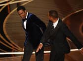 Will Smith, literally, hits out over Chris Rock's joke about Smith's wife (Picture: Getty Images)