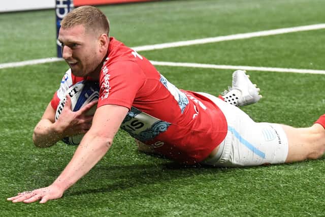 Racing 92's Finn Russell was in try-scoring form during the Champions Cup quarter-final win over Sale Sharks. (Photo by BERTRAND GUAY/AFP via Getty Images)