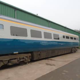 The late 1970s train carriages have been repainted in their original British Rail blue and white livery. Picture: WG Specialist Coatings