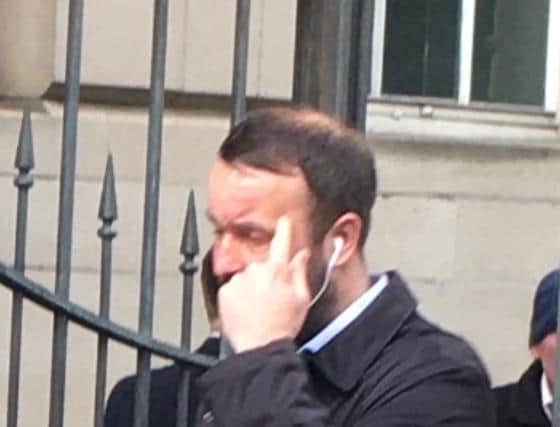 Dodgy ex-bank worker Hay breaks the news of his sentence as he leaves Edinburgh Sheriff Court.