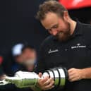 Shane Lowry of Ireland poses with the claret jug open trophy after winning the 148th Open Championship held on the Dunluce Links at Royal Portrush Golf Club on July 21, 2019 in Portrush, United Kingdom. (Photo by Andrew Redington/Getty Images)