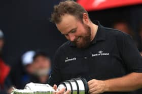 Shane Lowry of Ireland poses with the claret jug open trophy after winning the 148th Open Championship held on the Dunluce Links at Royal Portrush Golf Club on July 21, 2019 in Portrush, United Kingdom. (Photo by Andrew Redington/Getty Images)
