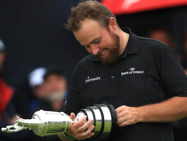 Shane Lowry of Ireland poses with the claret jug open trophy after winning the 148th Open Championship held on the Dunluce Links at Royal Portrush Golf Club on July 21, 2019 in Portrush, United Kingdom. (Photo by Andrew Redington/Getty Images)