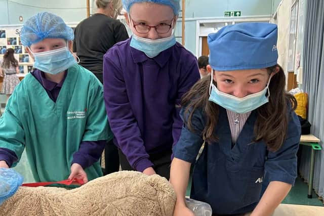 The children of St Palladius Primary School embracing their inner vets.