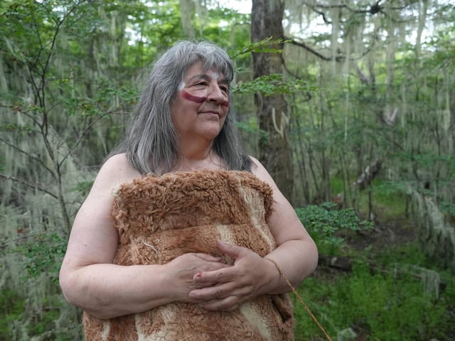Margarita Maldonado in traditional Selk'nam dress at Tolhuin, Tierra del Fuego, Argentina