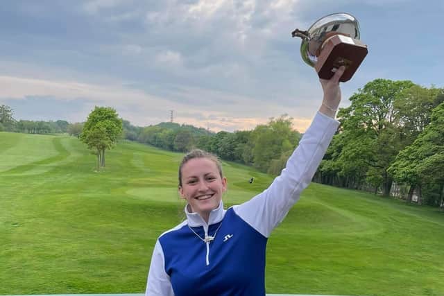 Broomiknowe's Kate McIntosh celebrates winning the Midlothian County Ladies' Championship for the fith time. Picture: MCLGA