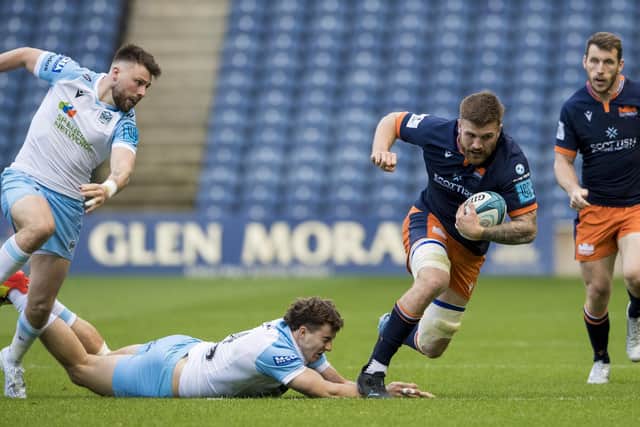Edinburgh's Luke Crosbie leaves Ali Price and Josh McKay in his wake during the 1872 Cup win over Glasgow Warriors at Murrayfield. (Photo by Ross Parker / SNS Group)