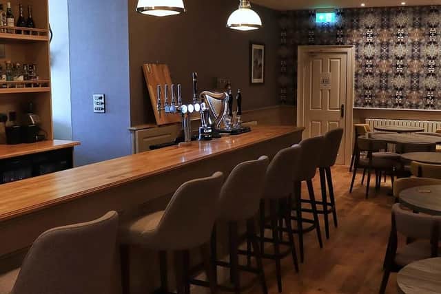 Guests can enjoy a drink in the cosy bar before or after dinner