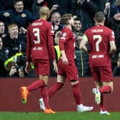 Mo Salah, far right, scored a rapid hat-trick for Liverpool.