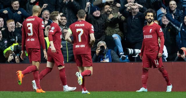 Mo Salah, far right, scored a rapid hat-trick for Liverpool.