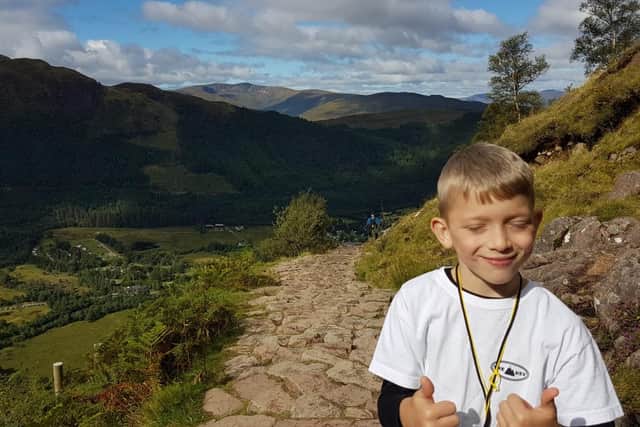 Caeden Thomson, from Corby, Northamptonshire, trekked the 4,411 ft ascent to the top of Ben Nevis in the Highlands on Saturday to raise money for his local NHS trust and disability equality charity Scope.